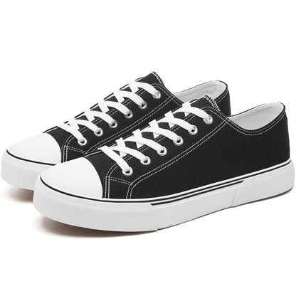 Men's canvas low-top sports shoes, featuring a classic casual design. This stylish pair comes in white and black colors and is suitable for daily wear.